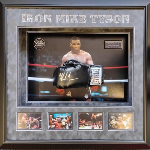 Signature of Mike Tyson on a black Boxing Glove